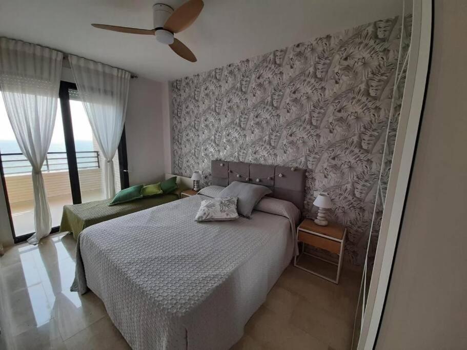 Top-Floor Beachfront Apartment With Parking, Pool, & Spacious Sea-View Balcony Villajoyosa Buitenkant foto